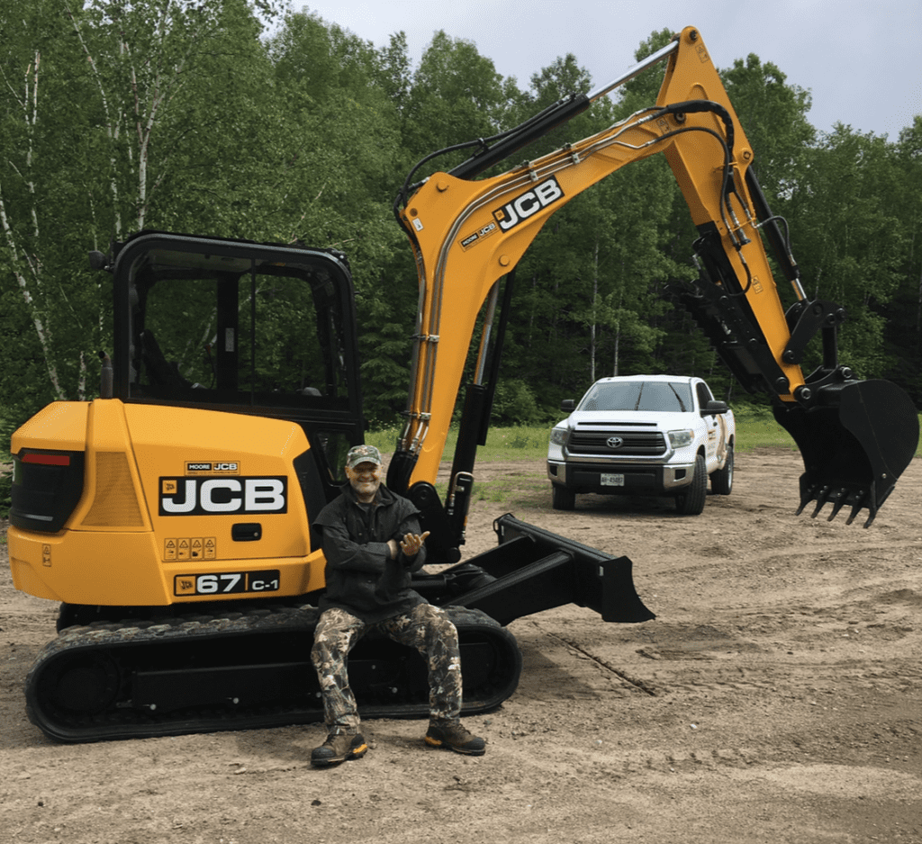 Ales Cervenak in front of JCB ACZ Contracting Main Image